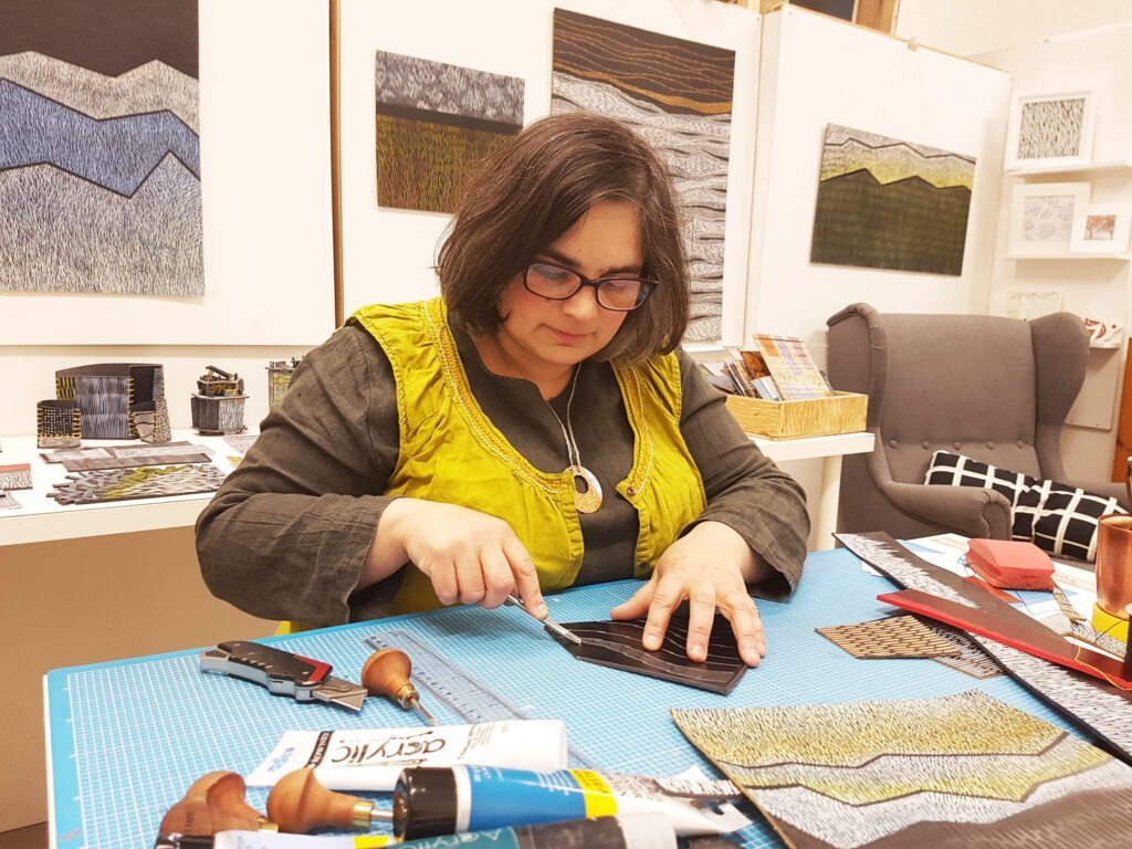 janine partington enamel artist in studio making